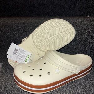 CROCS Classic Clog in Cream with Brown Sole